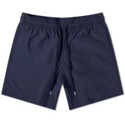 Klassiske ensfarvede navyblå badeshorts