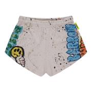 Shorts med trykt graffitimønster i slidt look