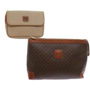 Pre-owned Canvas clutches