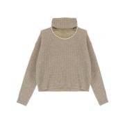 Stilfuld højhalset sweater