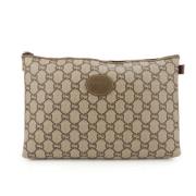 Pre-owned Canvas clutches