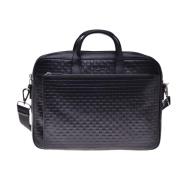 Crossbody bag in black woven print leather